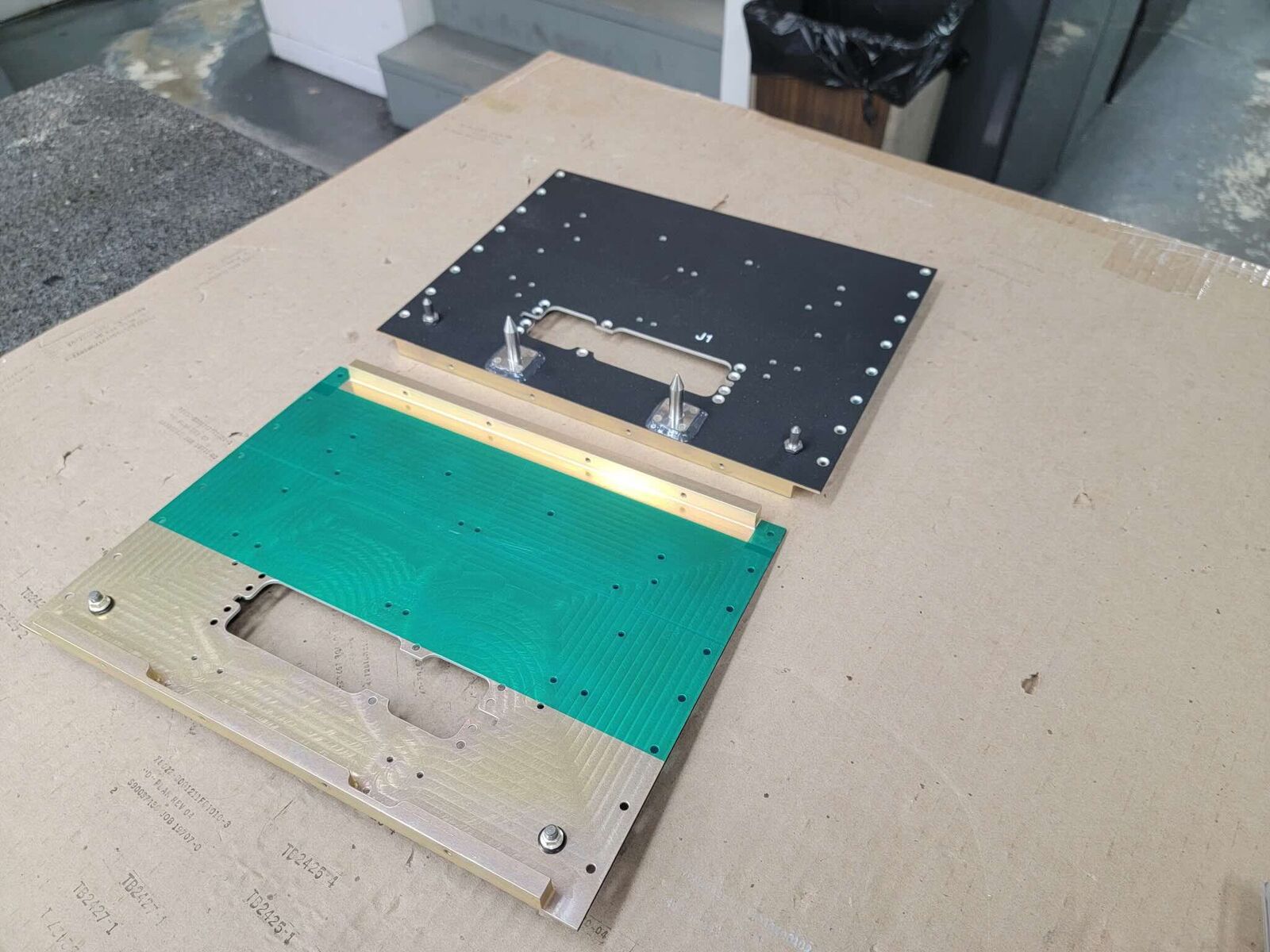 Machined plates with black and green finishes